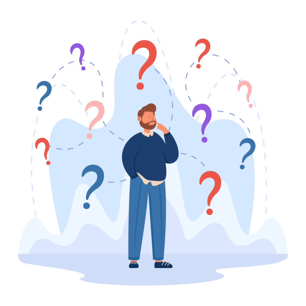 A man standing in front of a bunch of question marks.